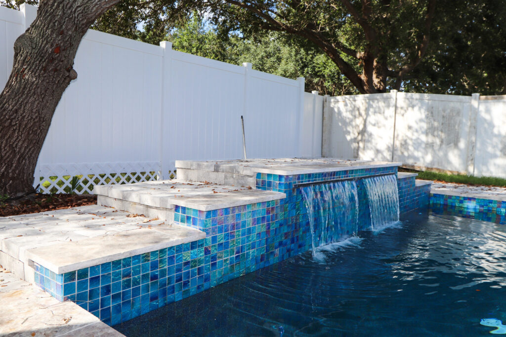 Waterfall feature on a custom pool | Winway Pools