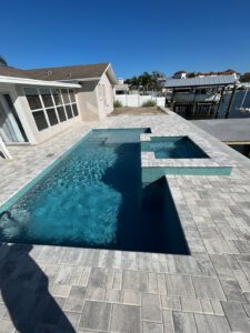 Custom pool with hot tub in St. Petersburg Florida area. Winway Pools
