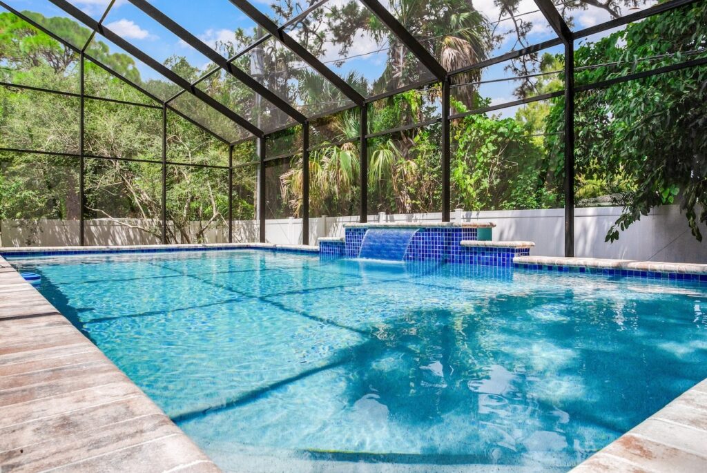Custom pool from Winway Pools with waterfall water feature.