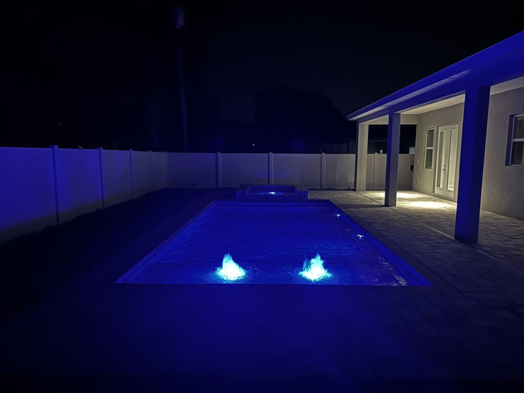 Custom pool nighttime blue lighting 2 | Winway Pools