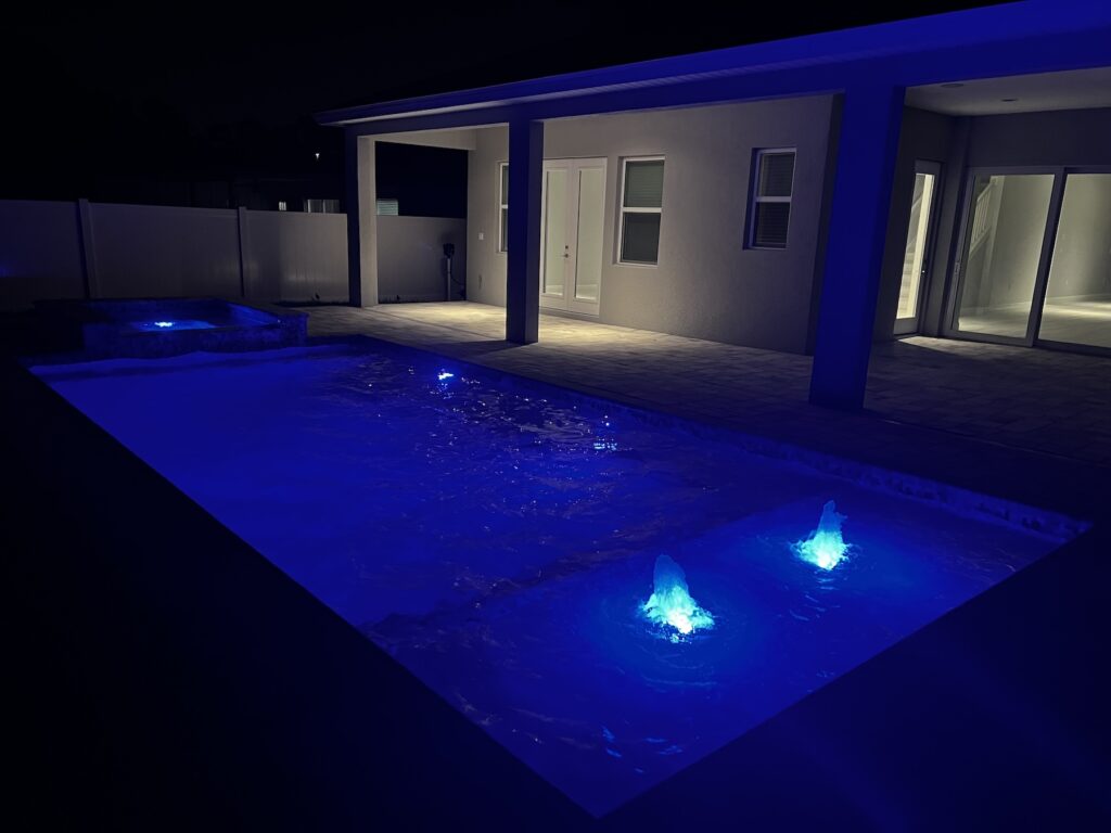 Custom pool nighttime blue lighting 1 | Winway Pools