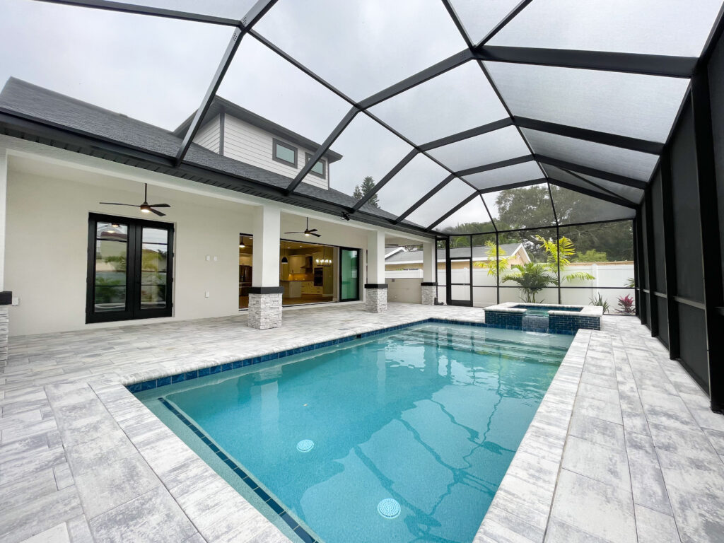Custom pool and glass canopy back house view | Winway Pools