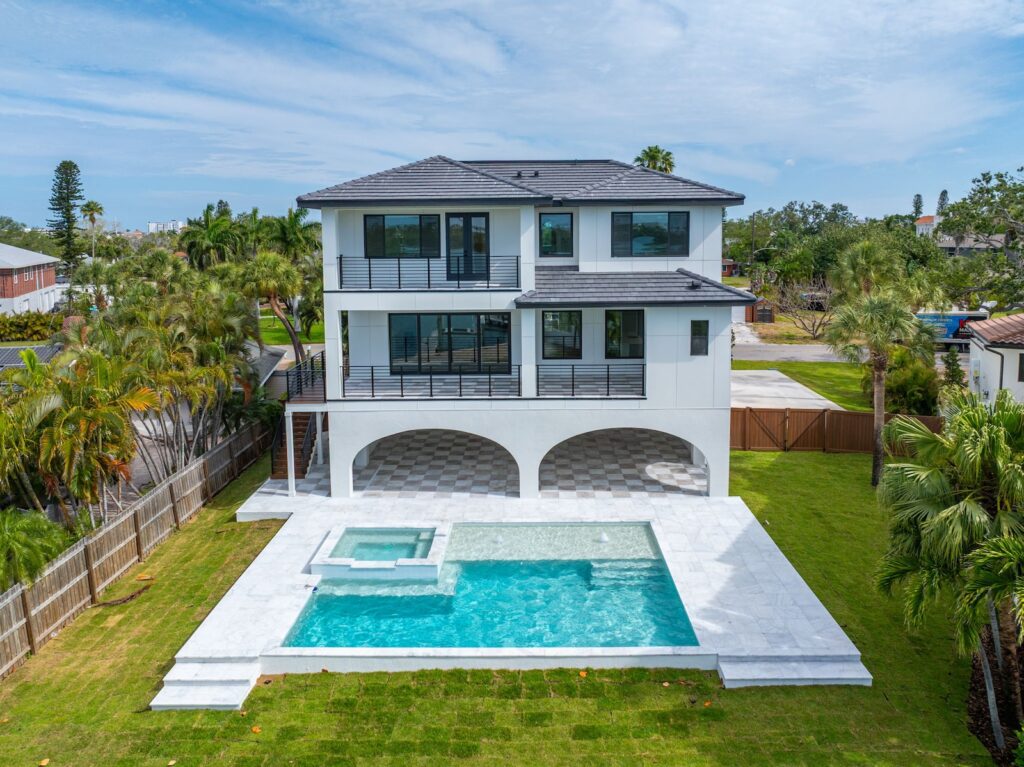 Luxurious three story home with custom pool from Winway Pools