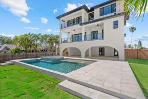 Custom pool built with custom home from Winway Pools.